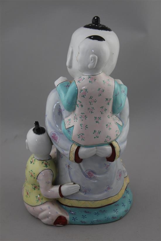 A Chinese enamelled porcelain group of boys, 20th century, 31cm